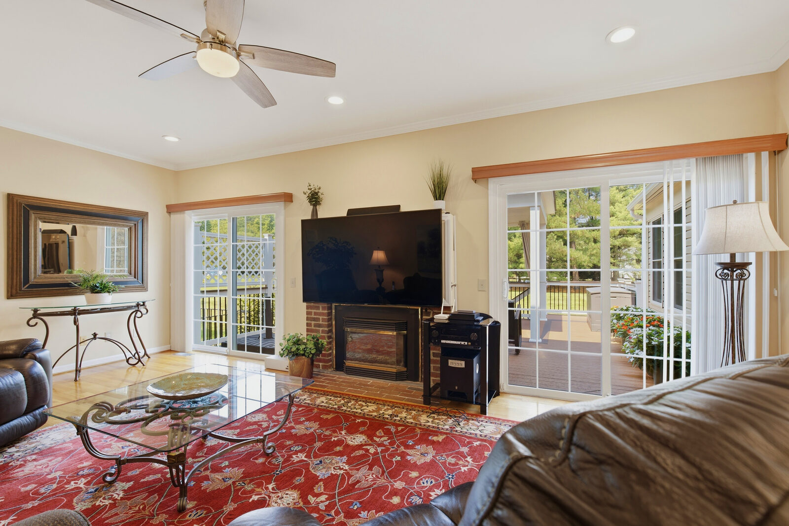 Family room with fireplace and French doors to the deck