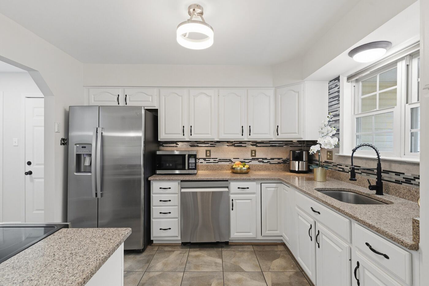 Kitchen with granite counters and stainless appliances