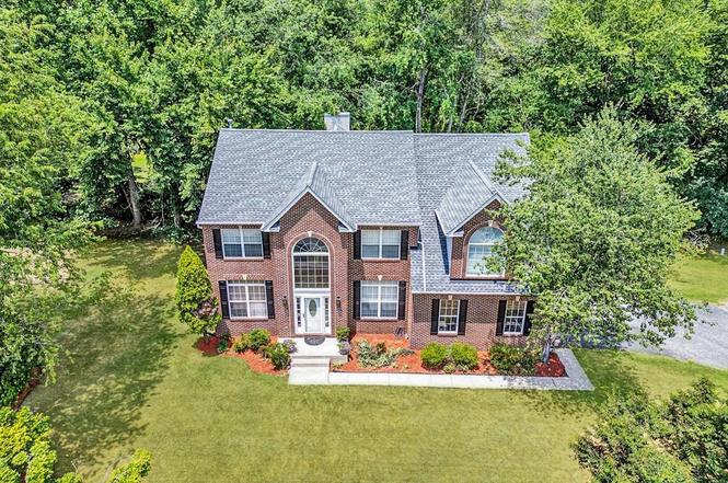 A brick colonial home in Woodmore Highlands