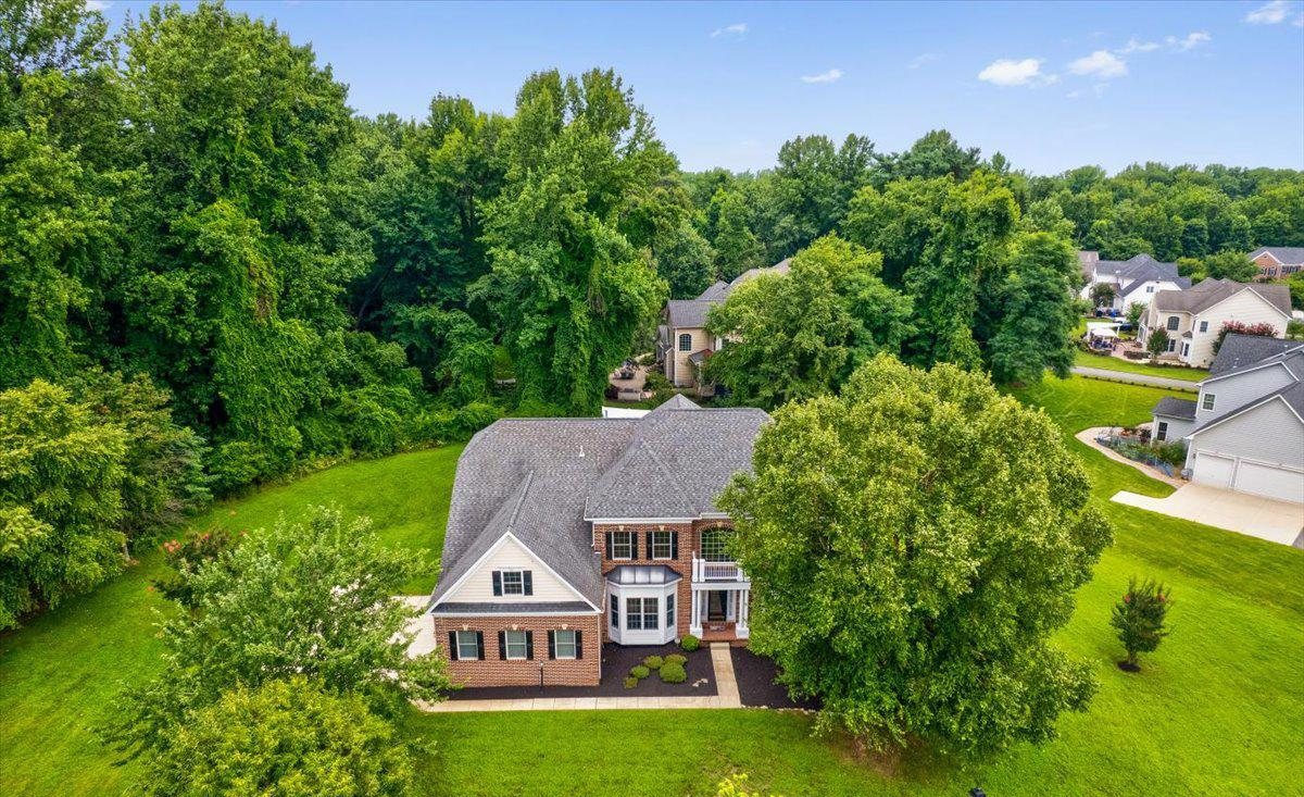 Brick colonial home on a landscaped lot in Woodmore Estates, Prince George’s County, Maryland